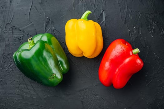 Sweet bell pepper, on black background, top view flat lay
