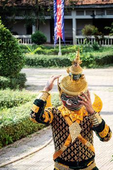 performer with traditional Lakhon Khol mask dance ceremony costume at Wat Svay Andet UNESCO Intangible Cultural Heritage site in Kandal province Cambodia