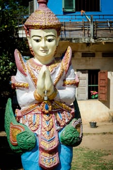 buddhist religious Khmer statue outdoor at Wat Svay Andet UNESCO Lakhon Khol heritage temple in Kandal Province Cambodia