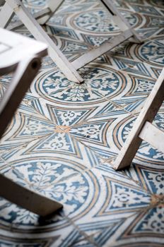 traditional design old rustic floor tiles detail in seville andalucia cafe