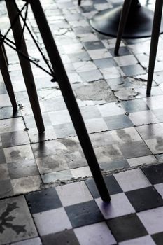 traditional design old rustic floor tiles detail in trendy Ibiza cafe