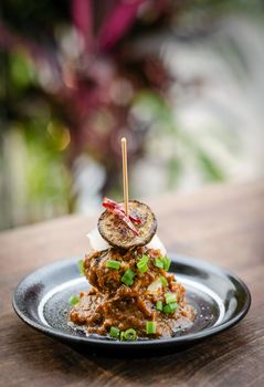 vegan quinoa cakes with sicilian roasted eggplant and spicy red pepper sauce gourmet tapas appetizer snack