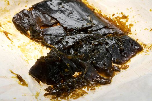 medical marijuana shatter wax processed cannabis oil concentrate closeup in california