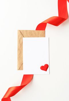 Valentines Day. Blank greeting card with envelope and red ribbon mock up template for Valentines Day