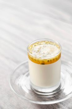 vegan dairy free organic coconut cream panna cotta with passion fruit dessert