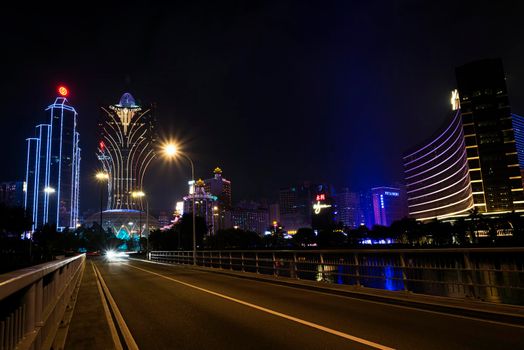 urban view of casino buildings at night in macau city china