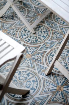 traditional design old rustic floor tiles detail in seville andalucia cafe