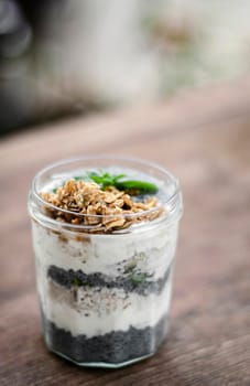 homemade healthy rustic yoghurt and granola with basil seeds breakfast snack cup