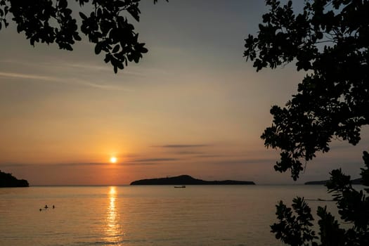 view from rustic wood sun deck on Koh Ta Kiev island near Sihanoukville  in Cambodia at sunset