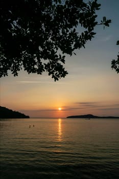 view from Koh Ta Kiev island  towards Koh Russei near Sihanoukville in Cambodia at sunset