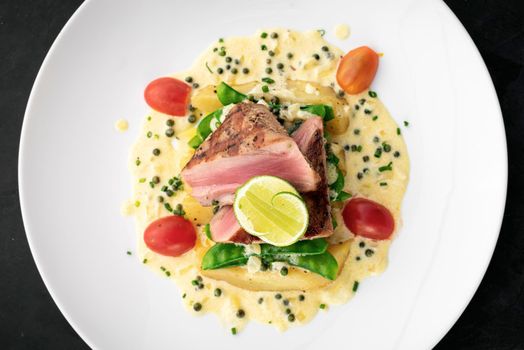 fresh seared tuna steak with creamy mustard and kampot pepper sauce