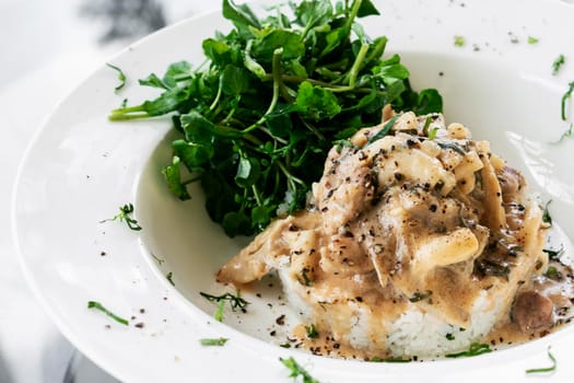 Pork Stroganoff with mushroom cream and paprika sauce gourmet meal in restaurant