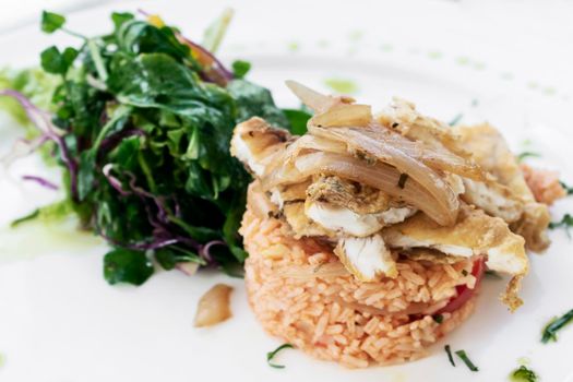 Portuguese fish in Escabeche sauce with tomato rice traditional gourmet food