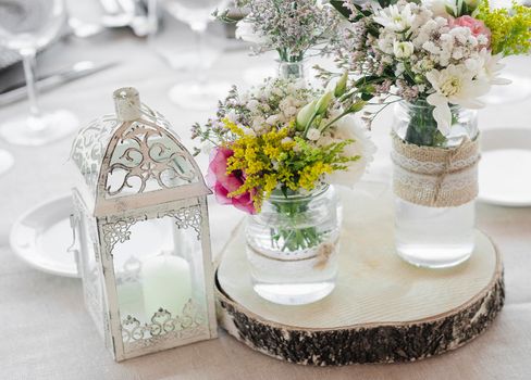 flowers arrangement and decoration rustic interior design in wedding table detail