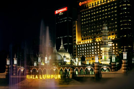 Jamek Mosque landmark in River of Life area of Kuala Lumpur city Malaysia at night