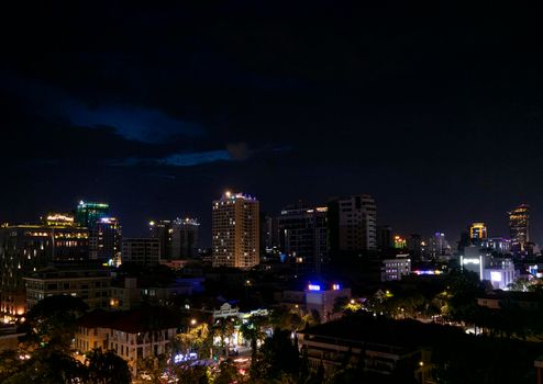 downtown central phnom penh city skyline night view in cambodia with modern skyscrapers