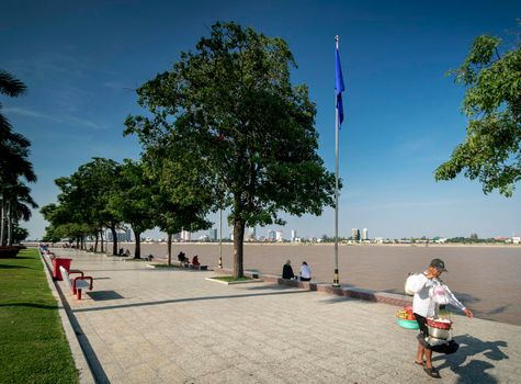 sisowath quay public riverside park in downtown phnom penh cambodia on sunny day