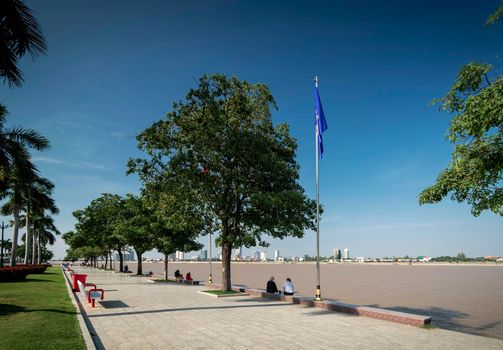 sisowath quay public riverside park in downtown phnom penh cambodia on sunny day