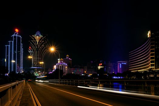 urban view of casino buildings at night in macau city china