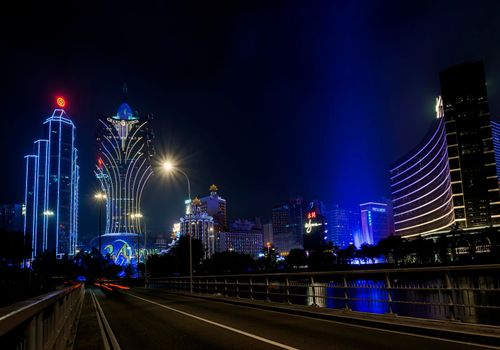 urban view of casino buildings at night in macau city china