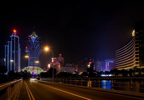 urban view of casino buildings at night in macau city china