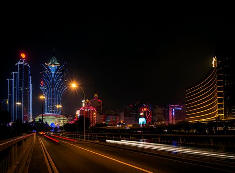 urban view of casino buildings at night in macau city china