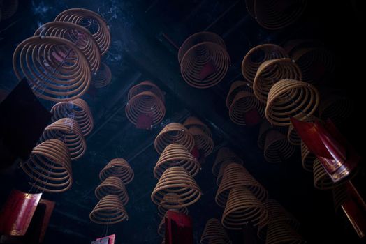 traditional  burning incense coils inside chinese a-ma buddhist temple in macau china