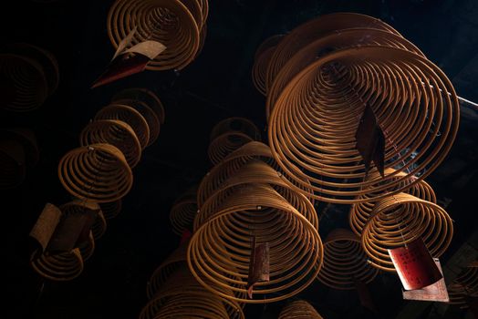 traditional  burning incense coils inside chinese a-ma buddhist temple in macau china