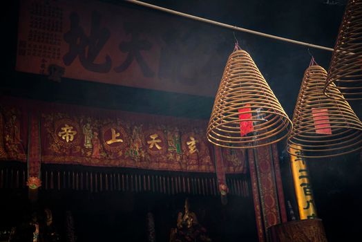 traditional  burning incense coils inside chinese a-ma buddhist temple in macau china