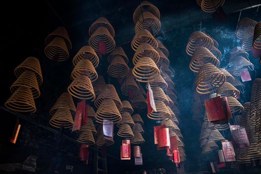 traditional  burning incense coils inside chinese a-ma buddhist temple in macau china