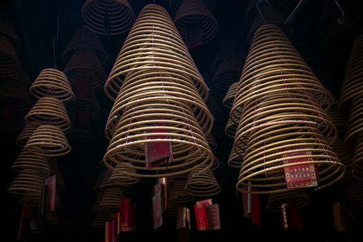 traditional  burning incense coils inside chinese a-ma buddhist temple in macau china