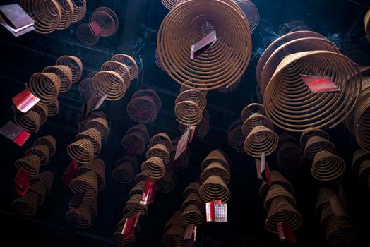 traditional  burning incense coils inside chinese a-ma buddhist temple in macau china