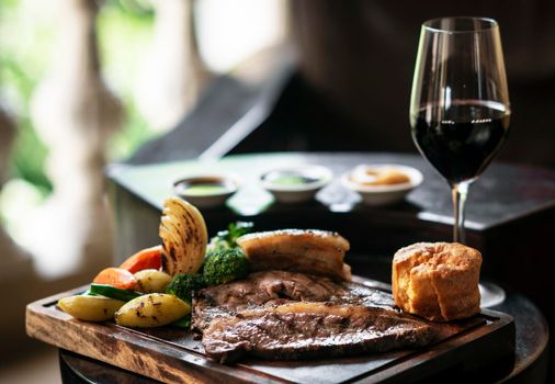 gourmet sunday roast beef traditional british meal set on old wooden pub table