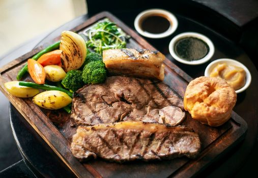 gourmet sunday roast beef traditional british meal set on old wooden pub table