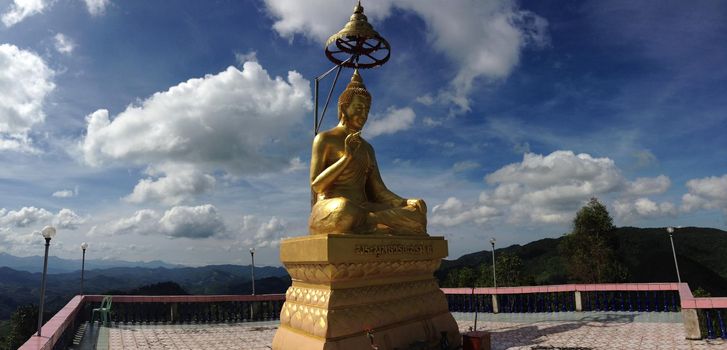 Golden Buddha statue panorama in Ban La-up Northern Thailand