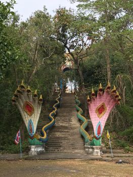 Stairs towards Wat Phanom Silaram (Khao Sawai) in Phanom Sawai Forest Park Thailand

