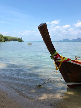 Long-tail boat at the beach on Koh Mook Island in Thailand