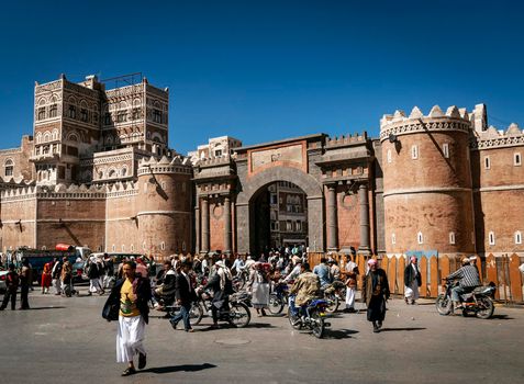 street scene and local heritage architecture buildings in old town of sanaa yemen at Bab Al Yemen gate