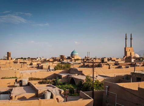 rooftops downtown mosque and landscape view of yazd city old town in iran