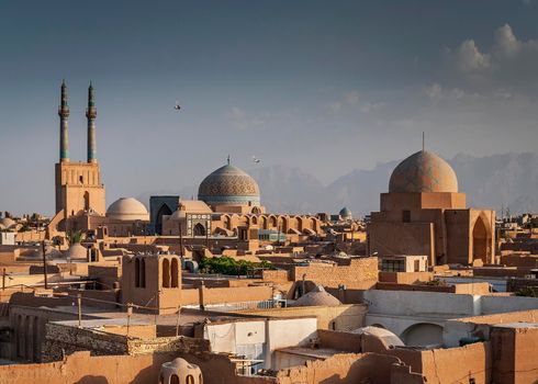 rooftops downtown mosque and landscape view of yazd city old town in iran