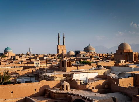 rooftops downtown mosque and landscape view of yazd city old town in iran