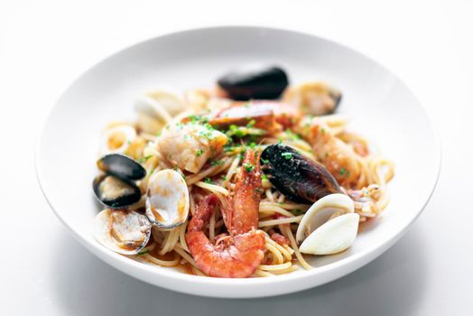 italian mixed fresh seafood spaghetti pasta with prawns mussels scallops and clams