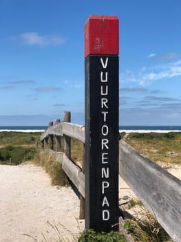 Lighthouse path towards the beach on Schiermonnikoog The Netherlands