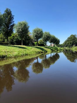 Canal in Earnewâld Friesland The Netherlands