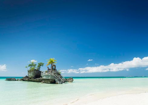white beach and christian shrine on boracay tropical island in philippines asia