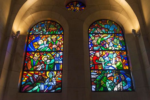 christian stained glass windows inside manila cathedral in philippines