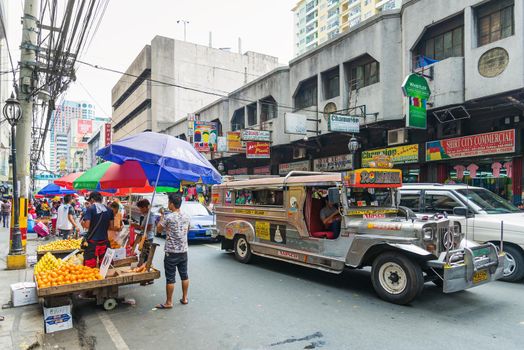 jeepney bus in manila chinatown street in philippines