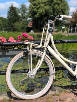 Bicycle on a bridge in Friesland The Netherlands