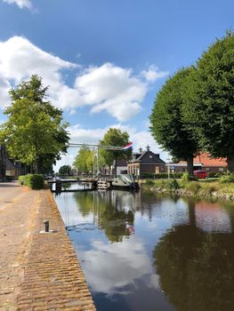 Canal and brigde of the turfroute in Gorredijk, Friesland The Netherlands