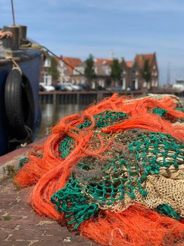 Fishing nets next to a boat in Harlingen, Friesland The Netherlands